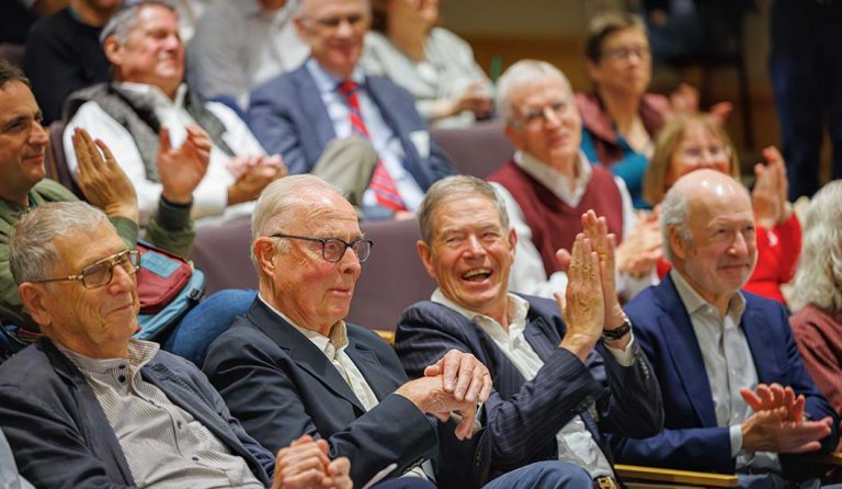 Dr. Rainer Storb (second from left) at the symposium in his honor.